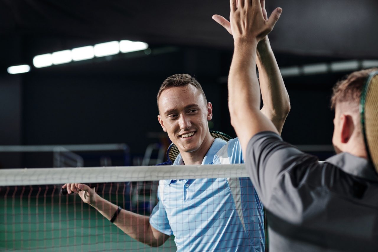 Friends Playing Badminton